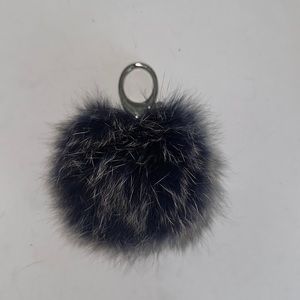 Rebecca mink off blue fluff keychain